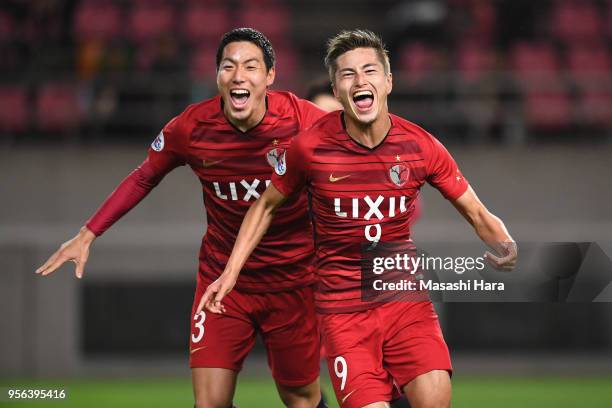 Yuma Suzuki of Kashima Antlers celebrates scoring the opening goal with his team mates during the AFC Champions League Round of 16 first leg match...