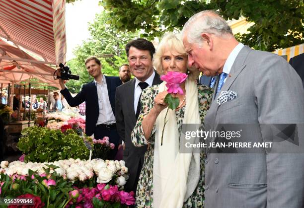 Britain's Charles, Prince of Wales, and Camilla, the Duchess of Cornwall, visit with Christian Estrosi, Mayor of Nice, the traditional market Cours...
