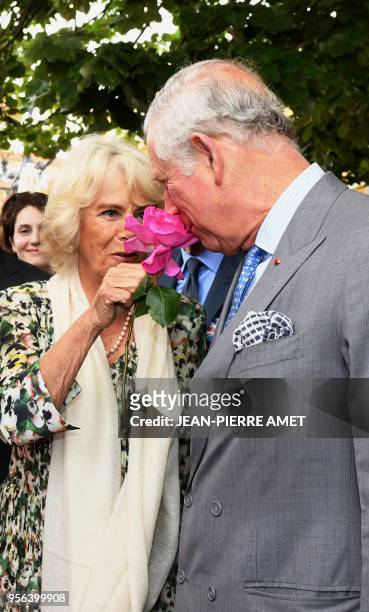Britain's Charles , Prince of Wales, and Camilla, the Duchess of Cornwall, visit the traditional market Cours Saleya in Nice, France, on May 9, 2018.
