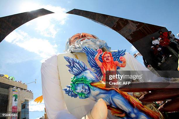 People look at a float during the 'White Day' , as part of the Whites and Blacks Carnival in Pasto, Colombia, on January 06, 2010. Last September 30...