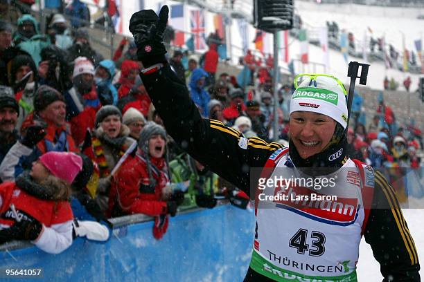 Simone Hauswald of Germany celebrates after winning the Women's 7,5km Sprint in the e.on Ruhrgas IBU Biathlon World Cup on January 8, 2010 in...