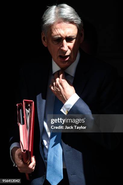 British Chancellor Philip Hammond leaves 11 Downing Street ahead of Prime Minister's Questions on May 9, 2018 in London, England. The Government...