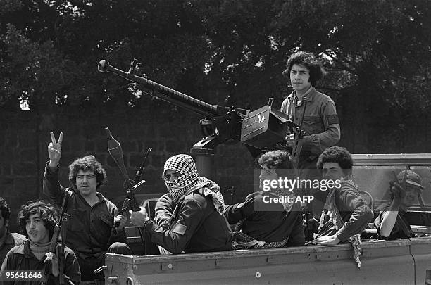 Members of Beirut based Sunni militia, al-Murabitun, take position 12 April 1976 in Beirut. Several Nasserite organizations, which adhered to the...