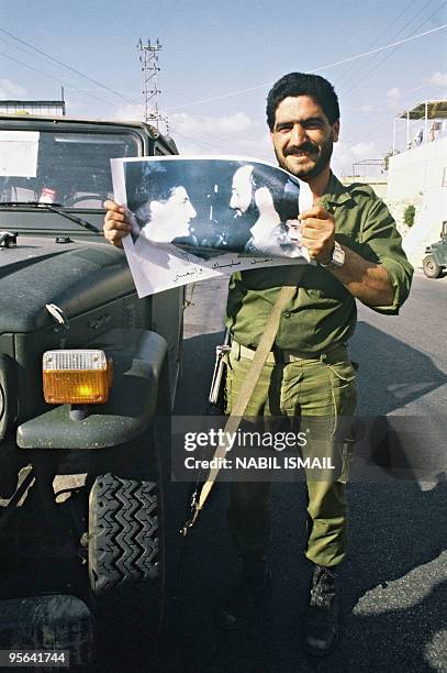 Member of Christian militia, the Lebanese Forces , backed by Lebanon's Christian Kataeb party, displays 20 March 1985 in Helta mountain, northern...