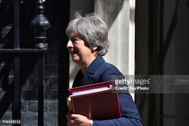 British Prime Minister leaves 10 Downing Street ahead to the House of Commons, to attend the weekly Prime Minister Questions and Answers session ,...