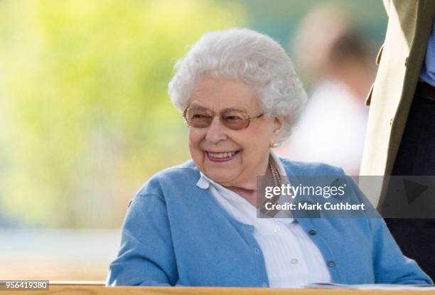 Queen Elizabeth II watches her horse Sparkler in the Flat Ridden Sport Horse event on the first day of The Royal Windsor Horse show at Home Park on...