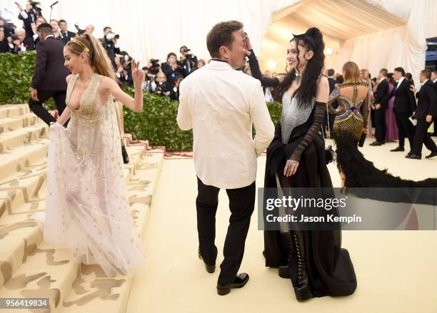 Elon Musk and Grimes attend the Heavenly Bodies: Fashion & The Catholic Imagination Costume Institute Gala at The Metropolitan Museum of Art on May...