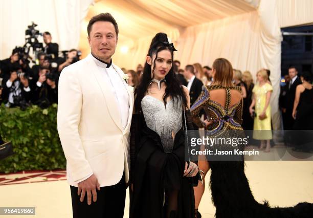 Elon Musk and Grimes attend the Heavenly Bodies: Fashion & The Catholic Imagination Costume Institute Gala at The Metropolitan Museum of Art on May...