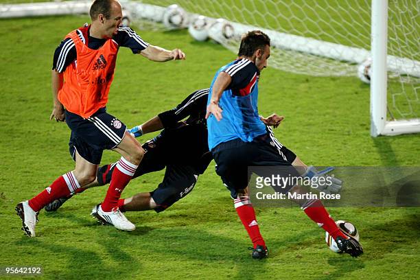 Diego Contento of Bayern Muenchen shoots a goal during the FC Bayern Muenchen training session at the Al Nasr training ground on January 8, 2010 in...