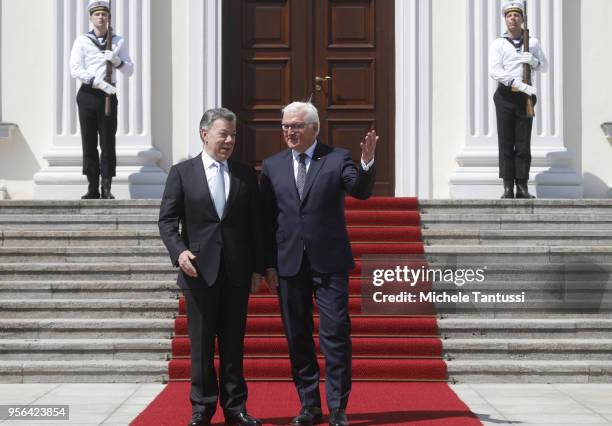 German President Frank-Walter Steinmeier welcomes Columbian President Jose Manuel Santos upon Santos's arrival at Schloss Bellevue palace on May 9,...