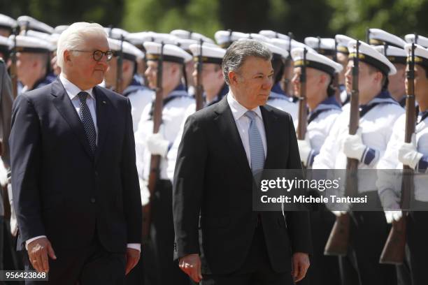 German President Frank-Walter Steinmeier and Columbian President Jose Manuel Santos review a guard of honor upon Santos's arrival at Schloss Bellevue...