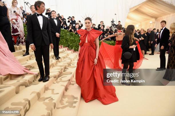 Pierpaolo Piccioli and Anne Hathaway attend the Heavenly Bodies: Fashion & The Catholic Imagination Costume Institute Gala at The Metropolitan Museum...