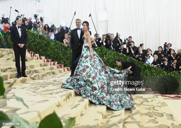 Actor George Clooney and Amal Clooney attends the Heavenly Bodies: Fashion & The Catholic Imagination Costume Institute Gala at The Metropolitan...