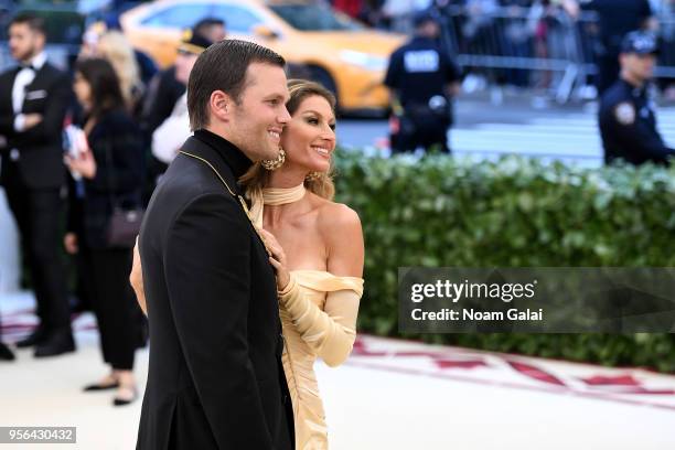 Player Tom Brady and model Gisele Bundchen attend the Heavenly Bodies: Fashion & The Catholic Imagination Costume Institute Gala at The Metropolitan...