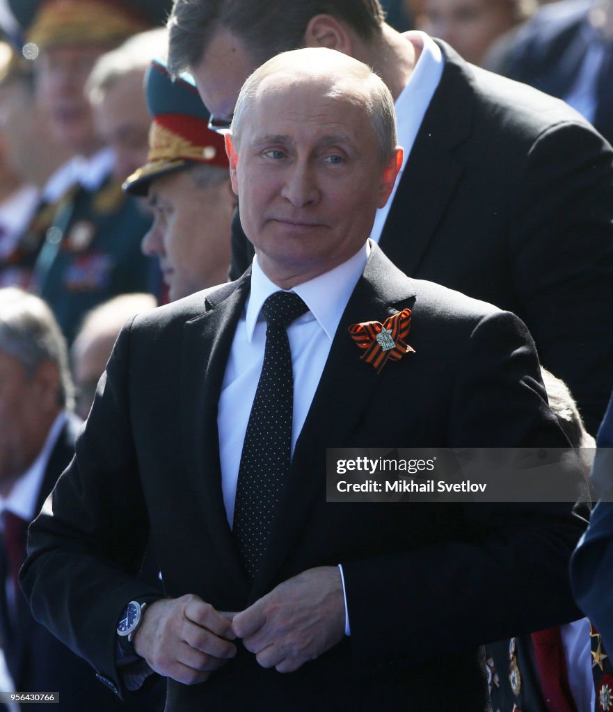 Russian President Vladimir Putin and Israel Prime Minister Benjamin Netanyahu watch the Red Square military parade