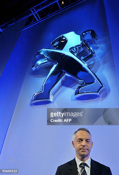 French carmaker Marketing and Communication director Xavier Peugeot poses on January 8, 2010 in front of the Peugeot logo at the end of a...