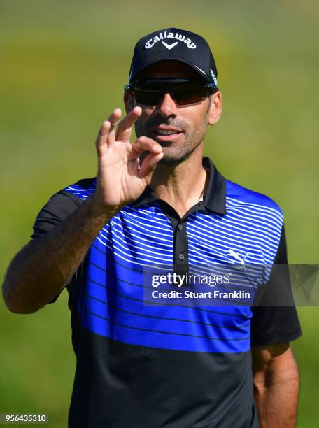 Defending Champion Alvaro Quiros of Spain gestures prior to the start of The Rocco Forte Open at the Verdura golf resort on May 9, 2018 in Sciacca,...