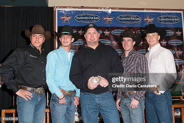 Bull riders Adriano Moraes, J.B. Mauney, Musician Garth Brooks, Kody Lostroh, and Ty Murray attend the PBR & Garth Brooks Teammates For Kids...