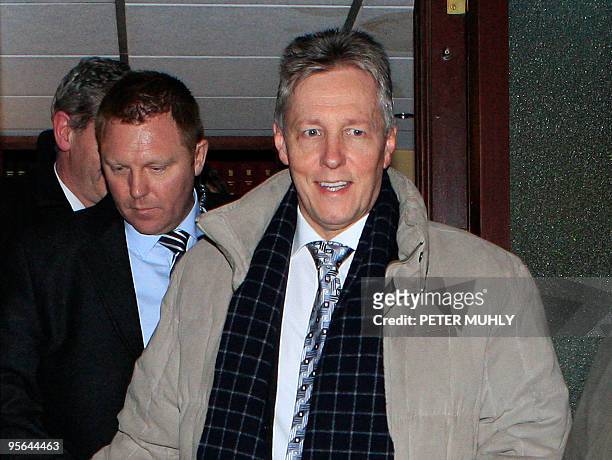 Northern Ireland's First Minister Peter Robinson departs from the Democratic Unionist Party Headquaters in Belfast, Northern Ireland, on January 8,...
