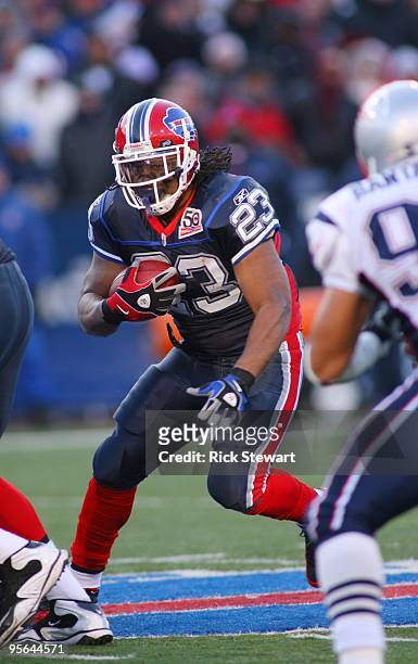 Marshawn Lynch of the Buffalo Bills runs the ball against the New England Patriots during the game at Ralph Wilson Stadium on December 20, 2009 in...