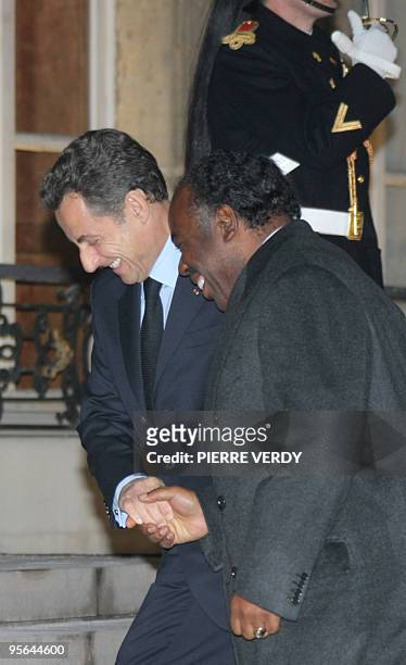 French President Nicolas Sarkozy welcomes his Gabonese counterpart Ali Bongo Ondimba on January 8, 2010 prior to a meeting on bilateral relations...
