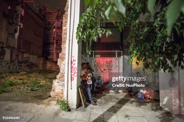 Pakistani migrants spending the night outdoors in Thessaloniki city in Greece. The group of men is denied to stay in any shelter even with the proper...