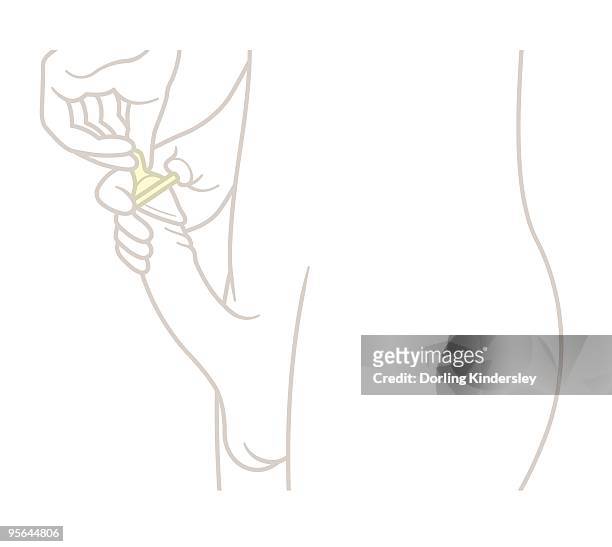 digital illustration of hand putting condom on head of erect penis - circumcised stock illustrations