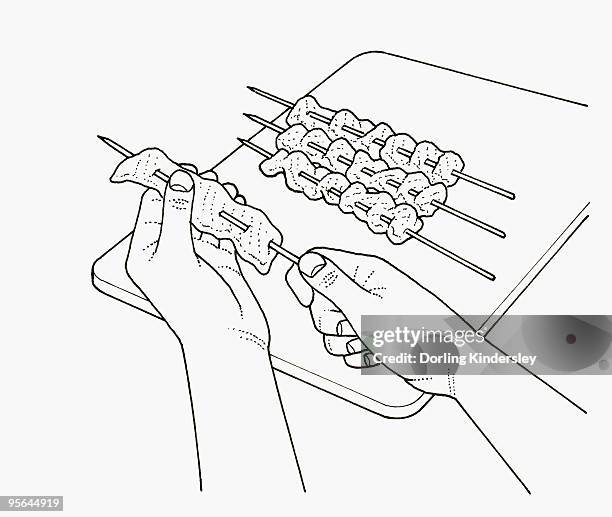black and white illustration of putting filleted fish on skewers - filleted stock illustrations