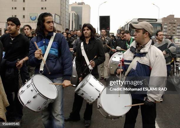 Iranian Muslims Shiites attend a ceremony to mark Ashura , the commemoration of the death of Imam Hussein , a grandson of Islam 's Prophet Mohammad ,...