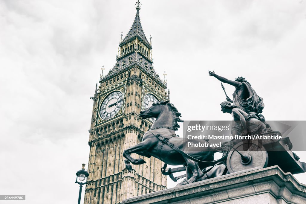 Detail of the statue of Boadicea and her daughters by Thomas Thornycroft (1815–1885) and the Big Ben
