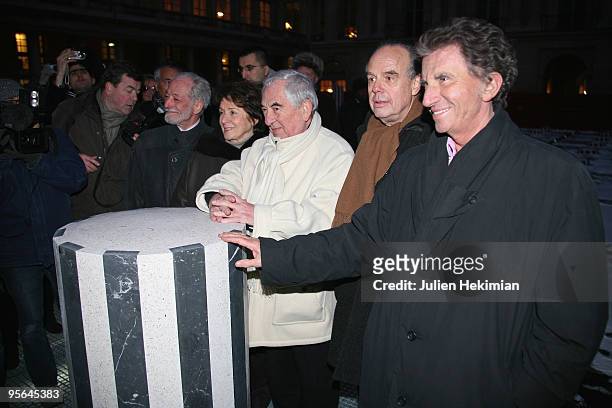 Catherine Tasca, architect Daniel Buren, French Culture minister Frederic Mitterrand and Jack Lang inaugurate Buren's restored sculpture "Les Deux...