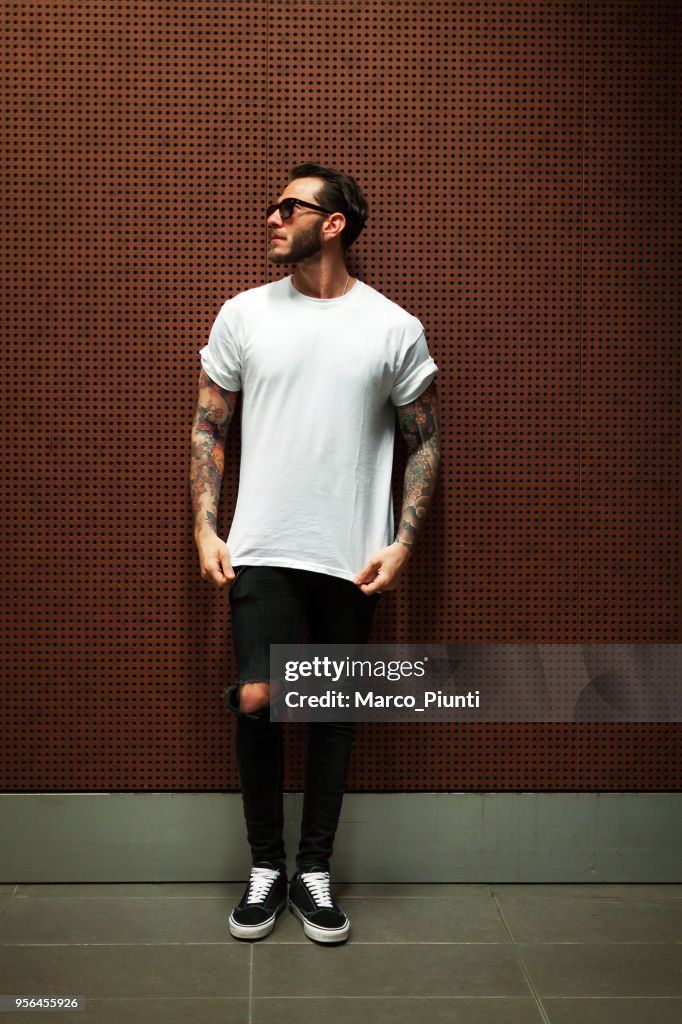 Portrait of tattooed young man