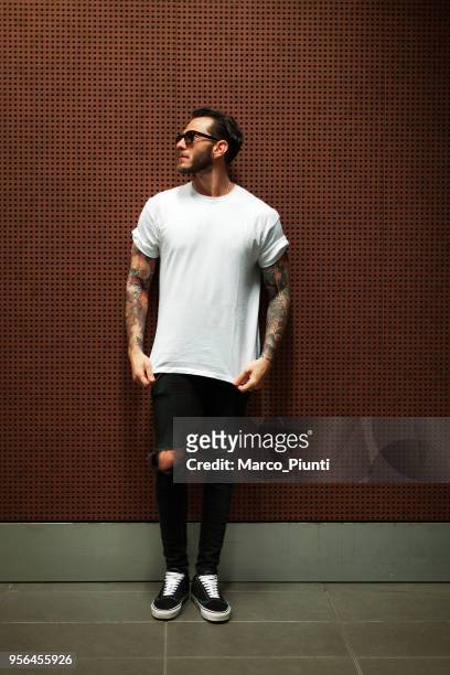 portrait of tattooed young man - blank t shirt model stock pictures, royalty-free photos & images