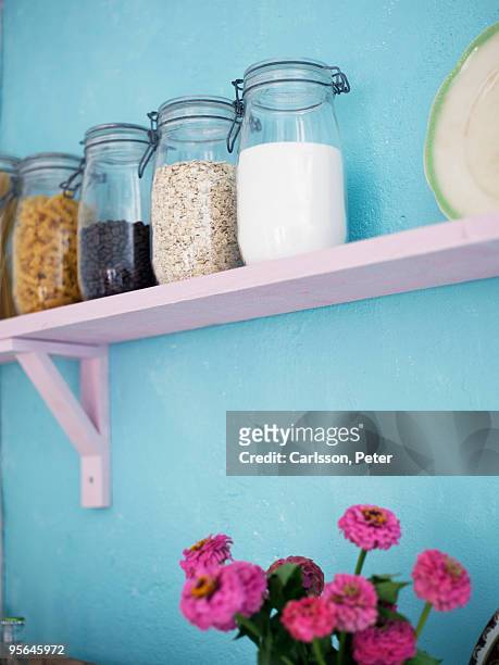 jars on a shelf, sweden. - cerise stock pictures, royalty-free photos & images