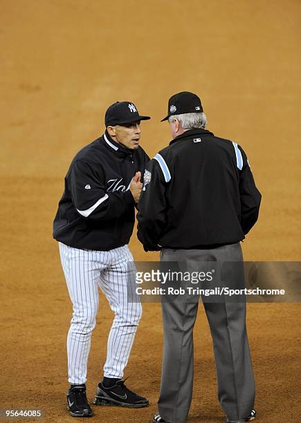 Manager Joe Girardi of the New York Yankees argues after a call with umpire Brian Gorman in the seventh inning against the Philadelphia Phillies...