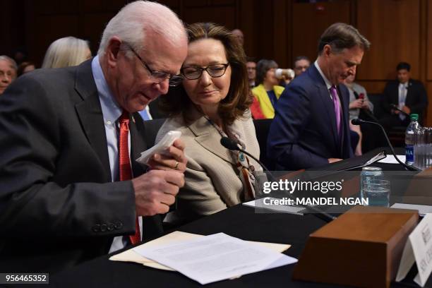 Gina Haspel arrives to testify next to former US Senator Saxby Chambliss and Sen Evan BayhD-IN before the Senate Intelligence Committee on her...