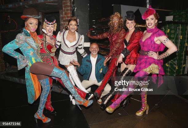 Christian Louboutin poses backstage with the "Angels" at the hit musical "Kinky Boots" on Broadway at The Hirschfeld Theatre on May 8, 2018 in New...