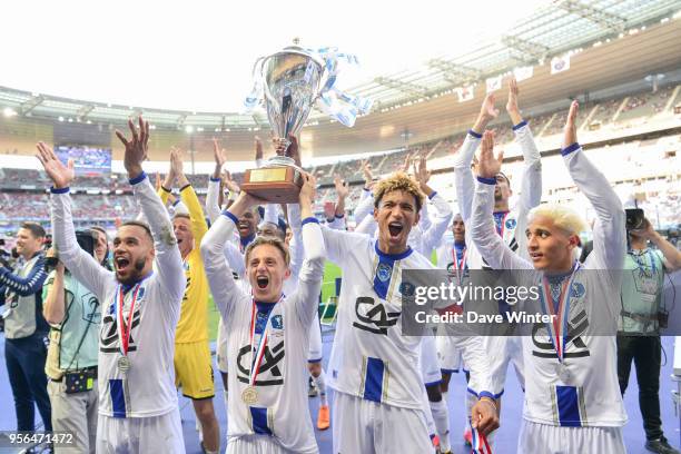 Bryan Mbeumo, Julien Masson and Calvin Bombo of Troyes celebrate winning the U19 National Cup Final match between Tours and Troyes at Stade de France...