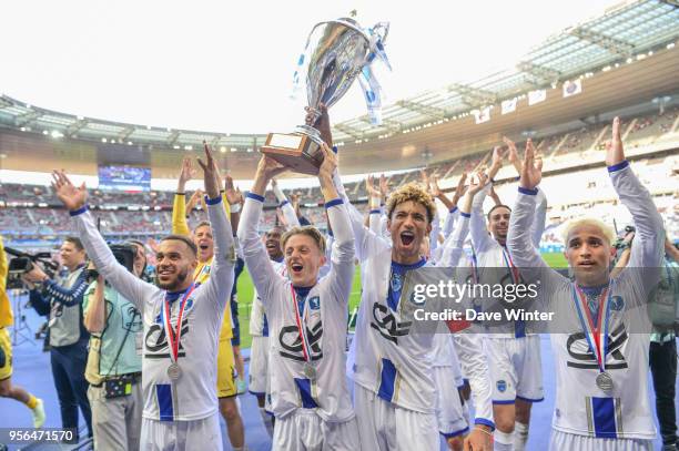 Bryan Mbeumo, Julien Masson and Calvin Bombo of Troyes celebrate winning the U19 National Cup Final match between Tours and Troyes at Stade de France...