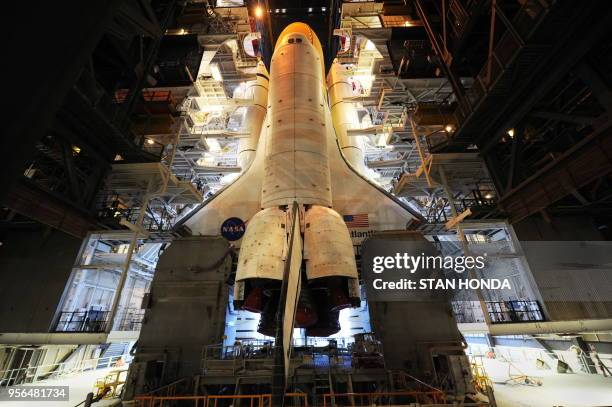 The space shuttle Atlantis stands ready in the Vehicle Assembly Building April 19, 2010 at Kennedy Space Center in Florida as NASA makes preparations...