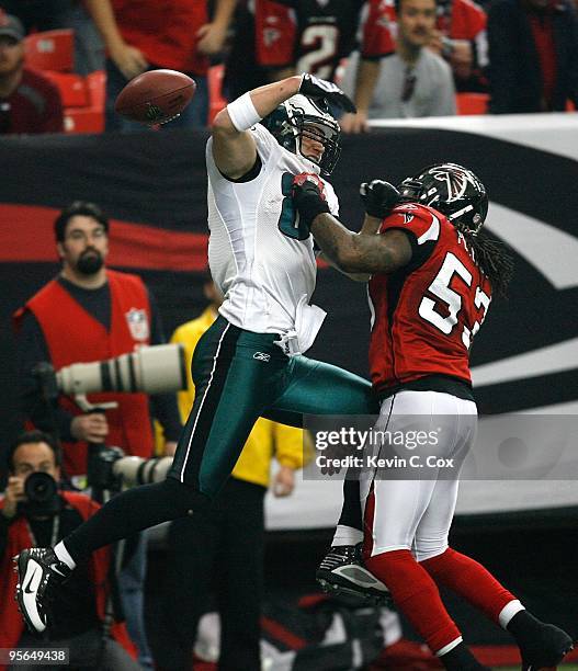 Mike Peterson of the Atlanta Falcons breaks up a touchdown reception to Brent Celek of the Philadelphia Eagles at Georgia Dome on December 6, 2009 in...