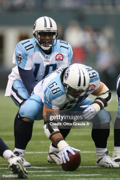 Vince Young of the Tennessee Titans stands under center Kevin Mawae during the game against the Seattle Seahawks on January 3, 2010 at Qwest Field in...