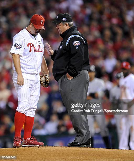 Joe Blanton of the Philadelphia Phillies is given a warning by second base umpire Joe West during Game Four of the 2009 MLB World Series against the...