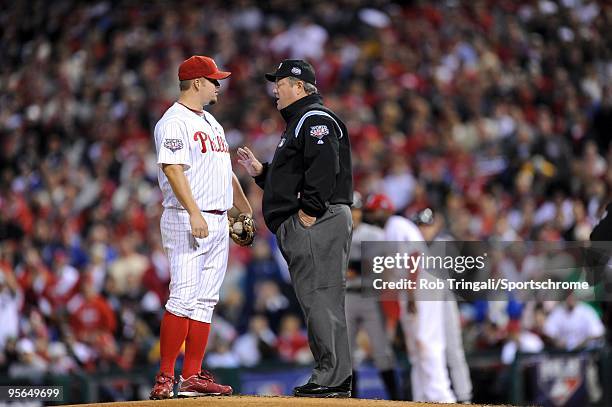 Joe Blanton of the Philadelphia Phillies is given a warning by second base umpire Joe West during Game Four of the 2009 MLB World Series against the...