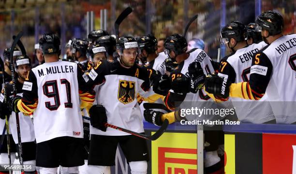 Leon Draisaitl of Germany celebrate with his team mates after he scores the opening goal during the 2018 IIHF Ice Hockey World Championship group...