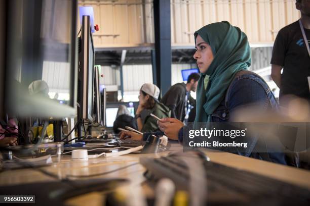 An attendee works on a computer in the Codelabs workroom during the Google I/O Developers Conference in Mountain View, California, U.S., on Tuesday,...