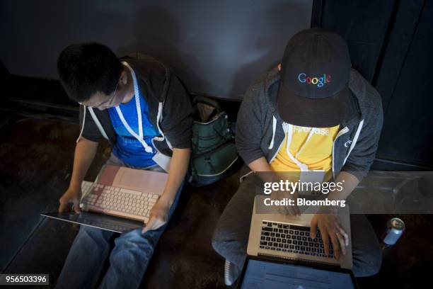 Attendees work on laptop computers in the Codelabs workroom during the Google I/O Developers Conference in Mountain View, California, U.S., on...