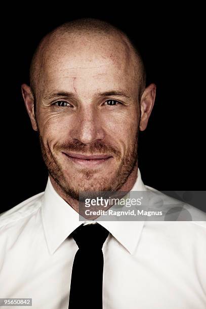 portrait of a man in white shirt. - guy with scar stock pictures, royalty-free photos & images