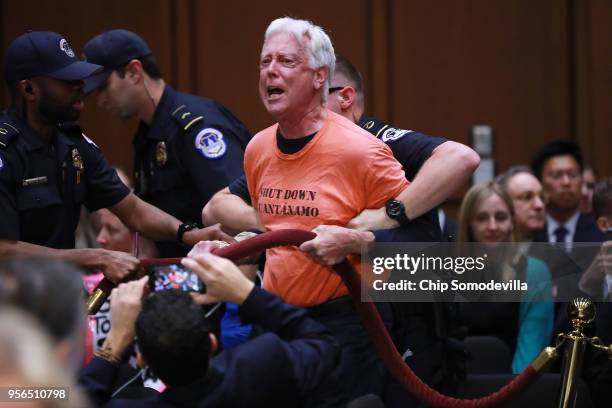 Code Pink for Peace demonstrator David Barrows is arrested by U.S. Capitol Police as he protests during Central Intelligence Agency acting Director...