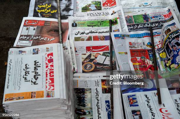 Display of newspapers sit for sale on a street outside a kiosk in Tehran, Iran, on Wednesday, May 9, 2018. U.S. President Donald Trump pulled out of...